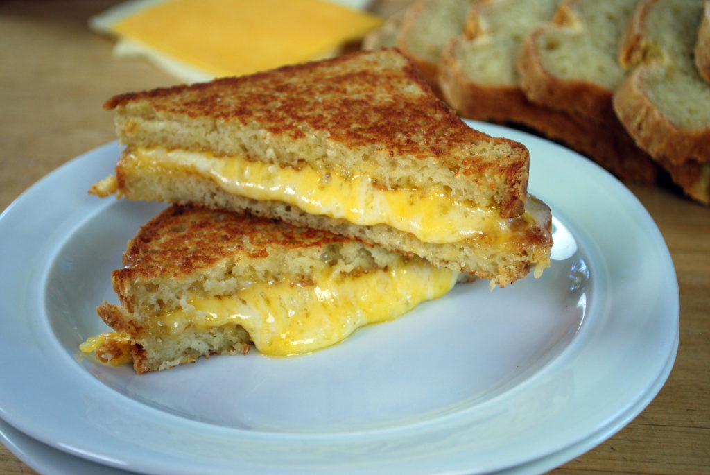 Finally used my pan that I got just for grilled cheese. Simple Tillamook  cheddar. Always two slices. Success! : r/grilledcheese