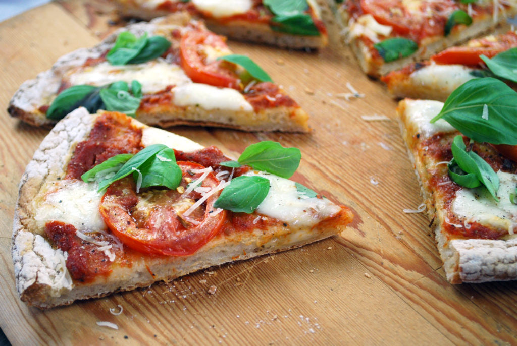 http://www.pamelasproducts.com/cdn/shop/articles/20211206222245-artisan-pizza-dough-margherita-350-1024x686.jpg?v=1639415515